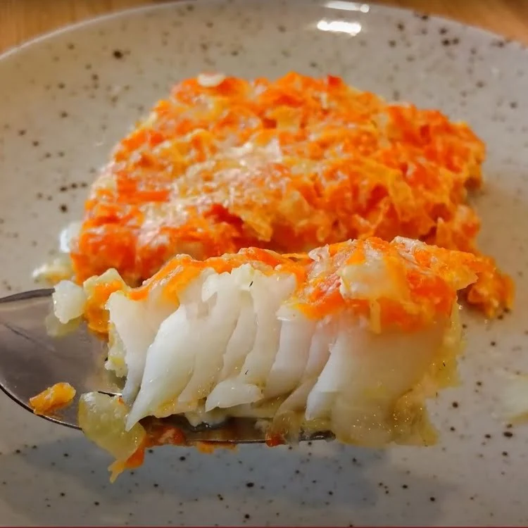 Baked pollock in milk-protein sauce with carrots